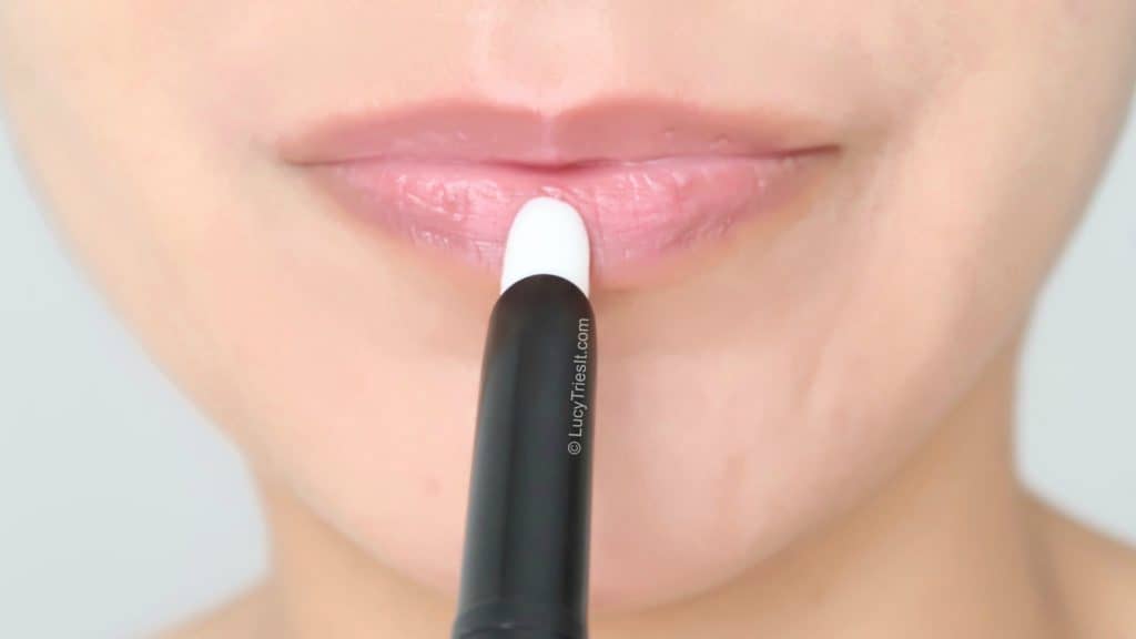 applying a lipstick base coat